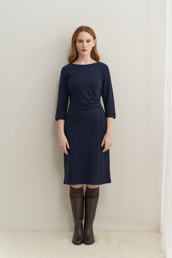 Dress with side pleats