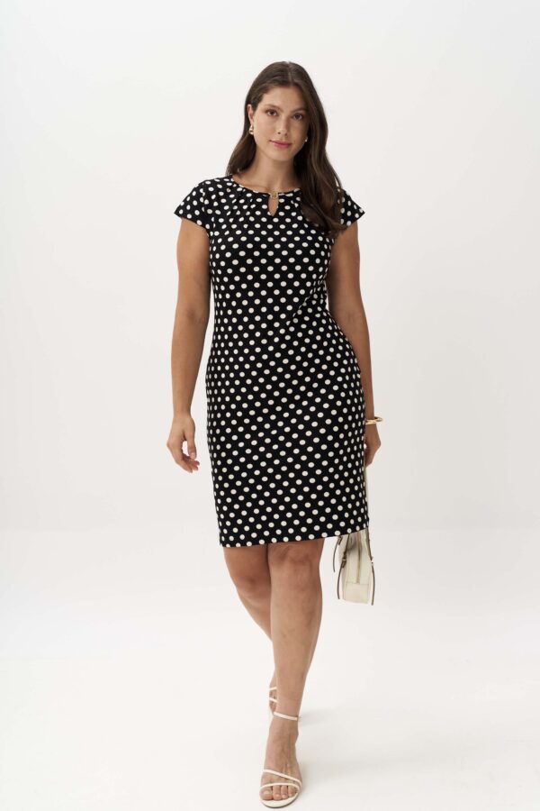 Polka dot dress with a pleat at the neckline