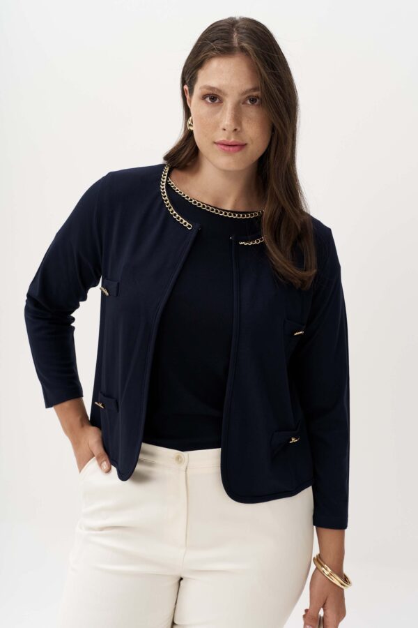 Jacket with chain and patch