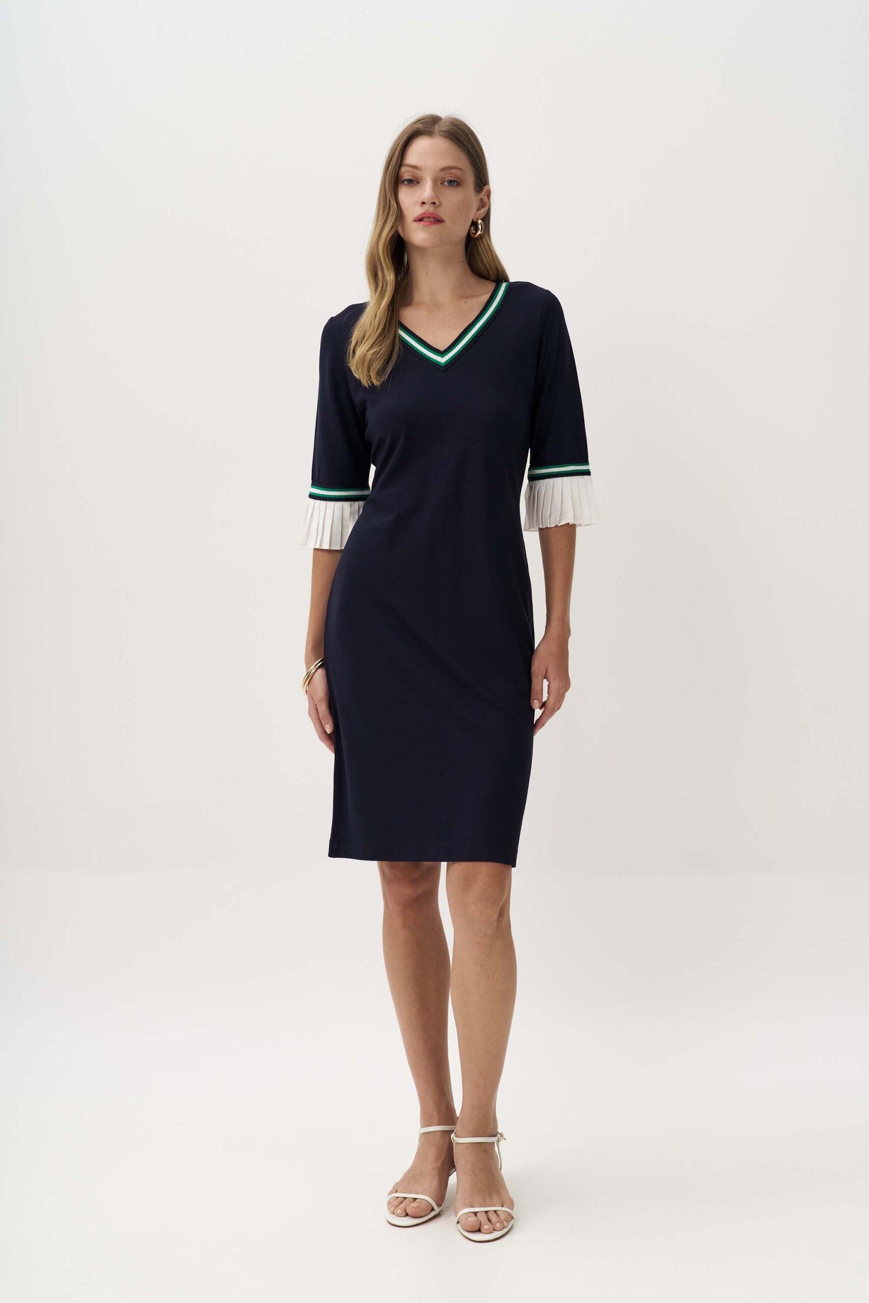 Dress with pleated sleeve